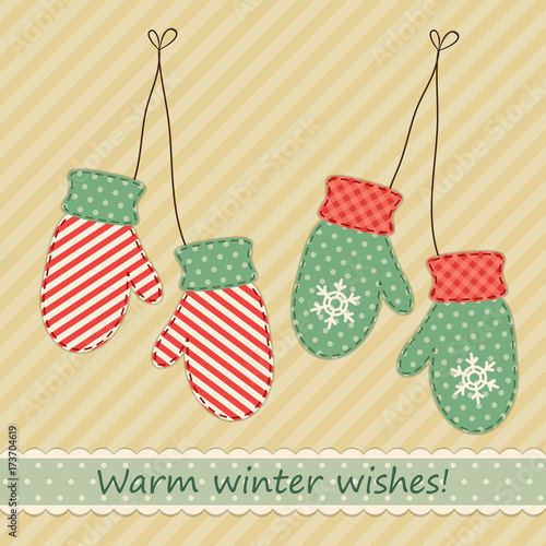 Cute fabric retro mittens as Christmas decorations in shabby chic style