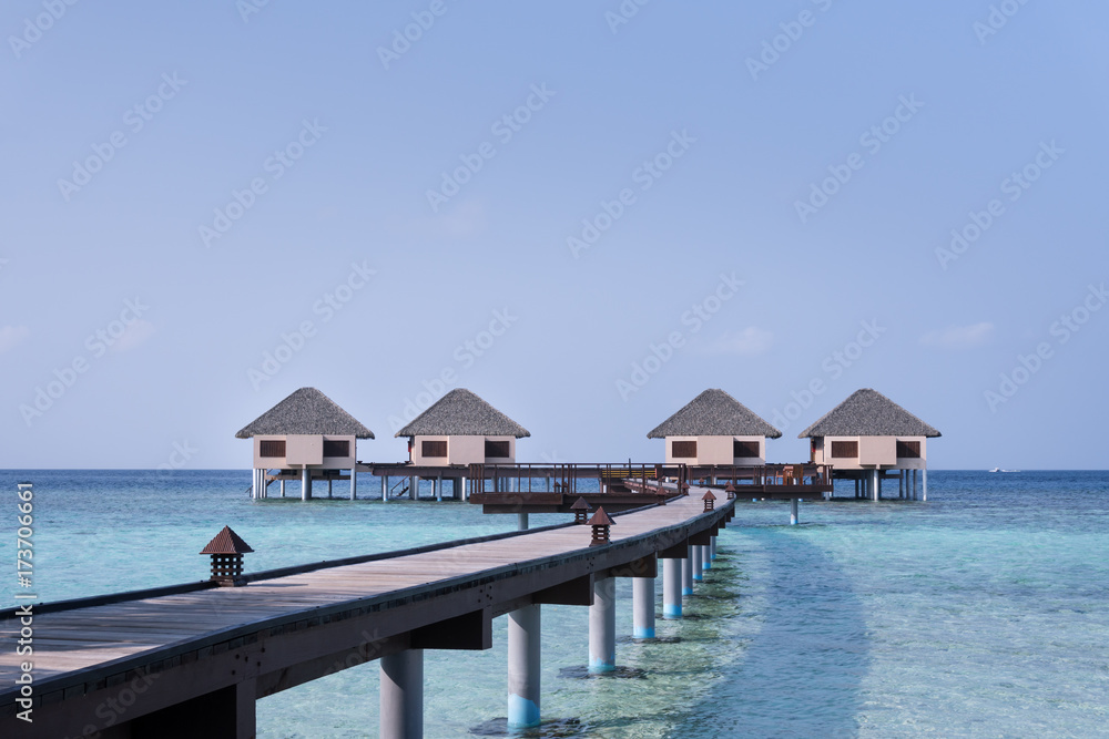 Tropical travel destination with water bungalows