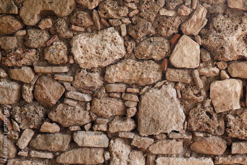 Texture of old bricks, castle wall and ancient ruins. background Texture of old bricks, castle wall and ancient ruins. background