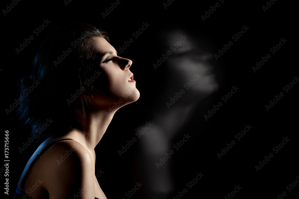 sensual dreaming woman in enjoyment at dark sensual dreaming woman in enjoyment at dark