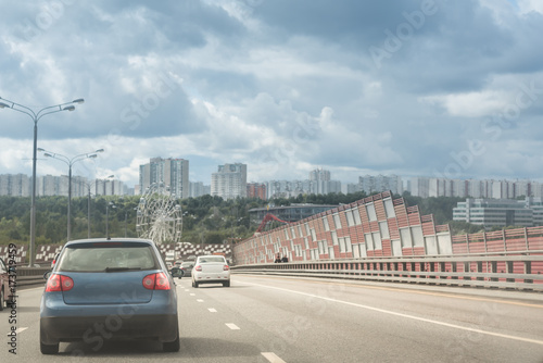 Highway interchange with bridge and clouds on the background © Mak