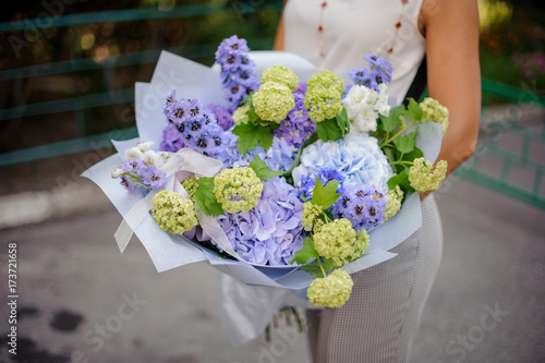 Wallpaper Mural Hands with a beautiful and gentle composition of flowers Torontodigital.ca