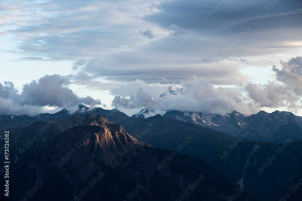 mountain range in the alps in the evening