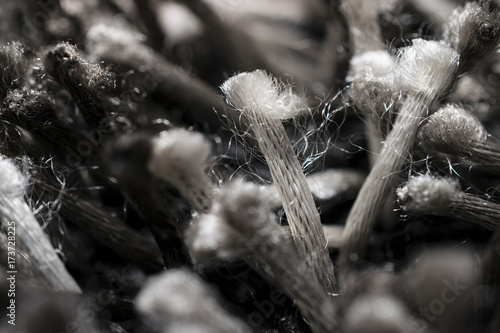 Close-Up Of Intricate Light Gray Synthetic Fiber Woven In Spiral