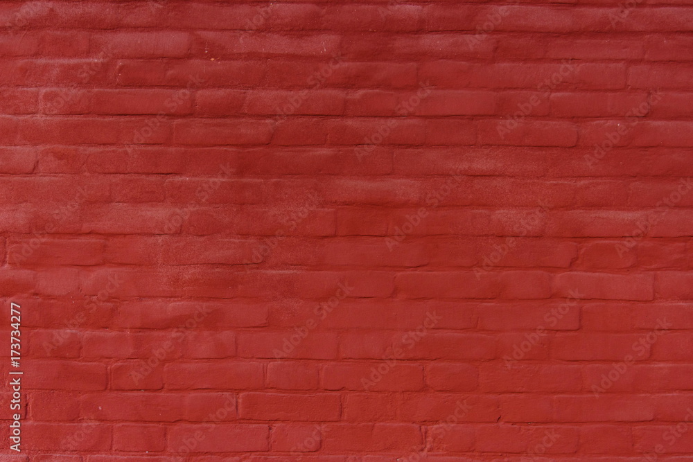 Obraz premium Brick wall painted red for background or texture