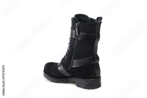 Black suede boot isolated on white background.