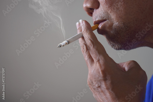 Man smoking cigarette.