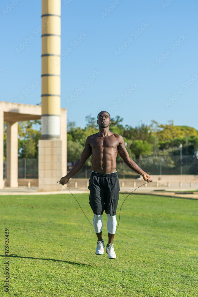 African American man training  jumping rope
