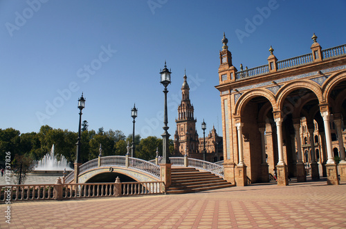 Bridge with lanterns over the boat canal leading to the palace on Spain Square (Plaza de Espana) in Seville (Sevilla), Spain. Example of Moorish and Renaissance revival. photo