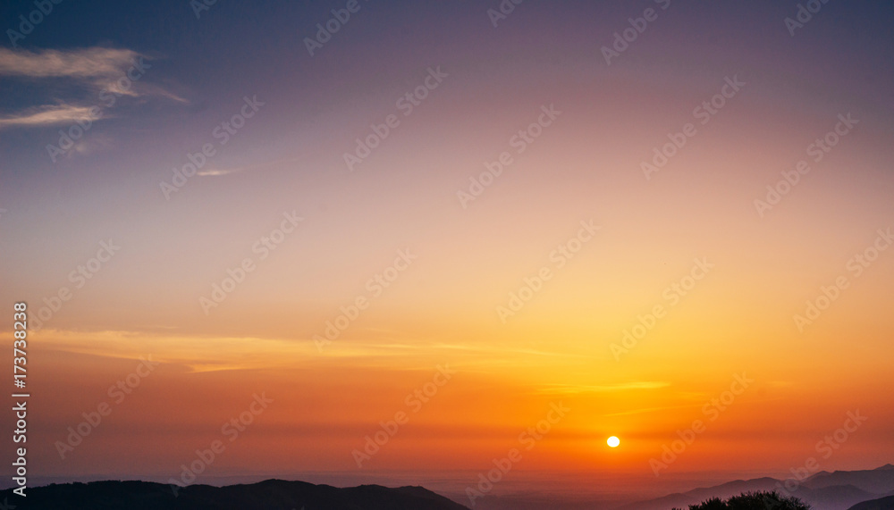 Fototapeta premium Sunset with sun rays, sky with clouds and sun