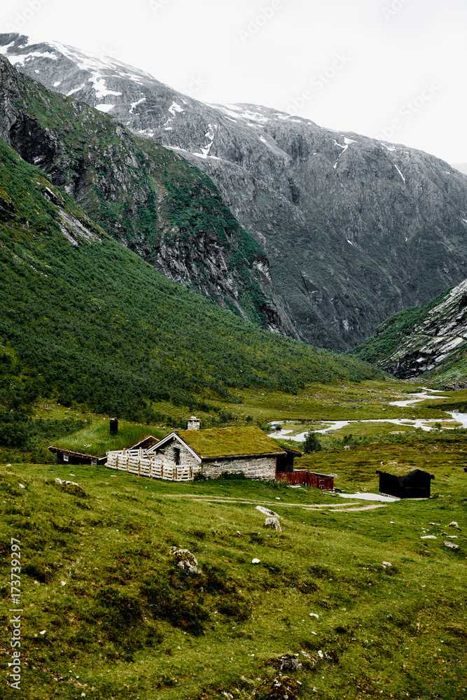 Old abandonned mountain village with colorful houses in a valley in Norway