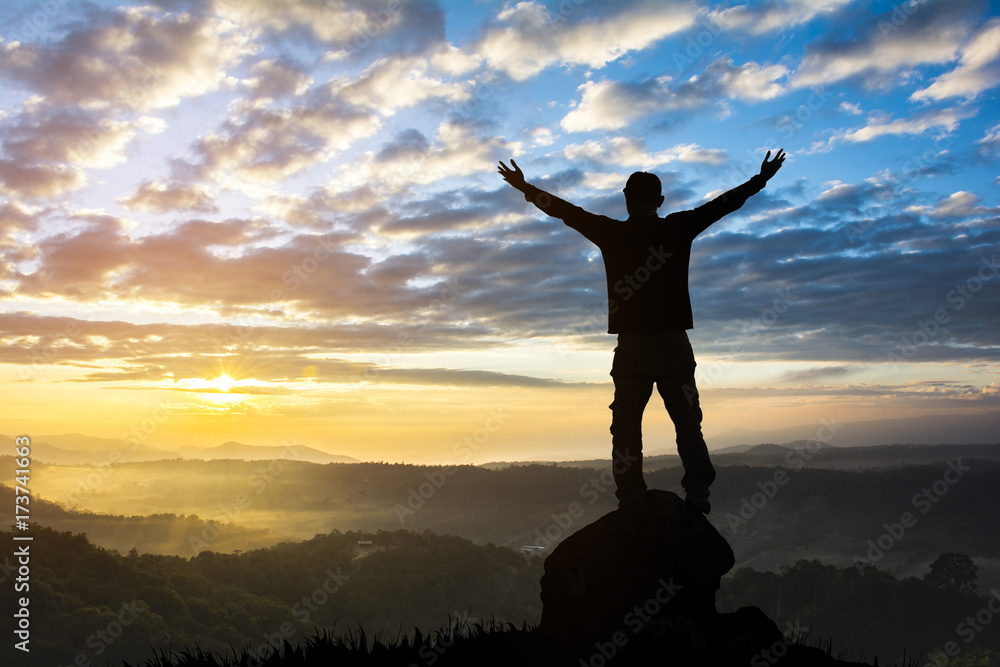 silhouette of successful climbing woman in mountains Concept of motion motivation inspiration at beautiful sunset