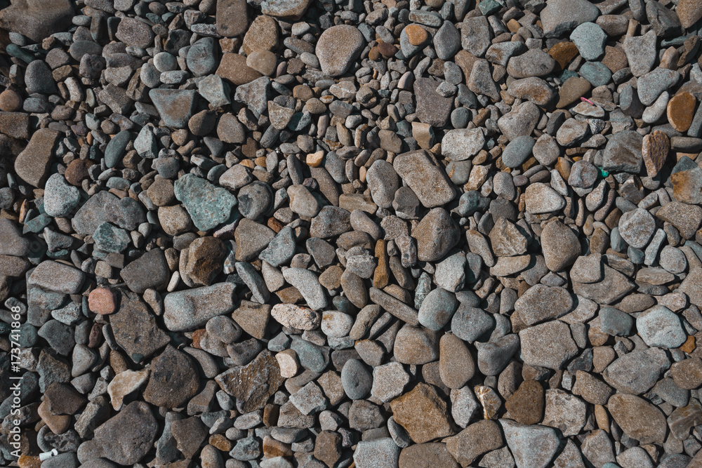 Beautiful flat stones on the seashore. Gorgeous background Beautiful flat stones on the seashore. Gorgeous background