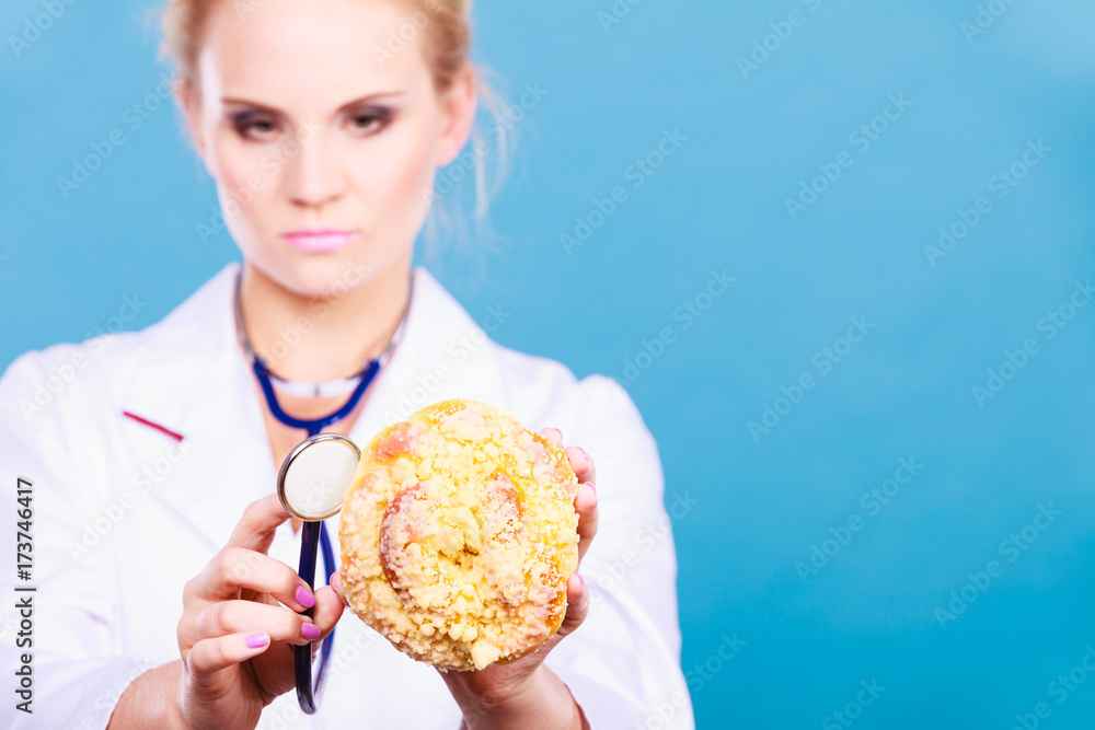 dietitian examine sweet roll bun with stethoscope dietitian examine sweet roll bun with stethoscope