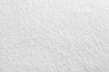 Bright white powder closeup macro texture pattern.