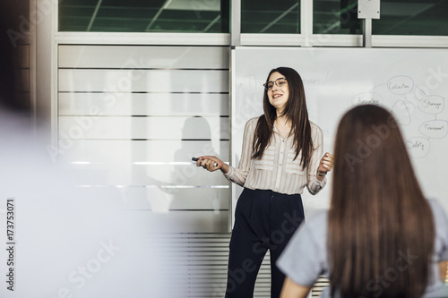 Woman Teacher Making Presentation at School