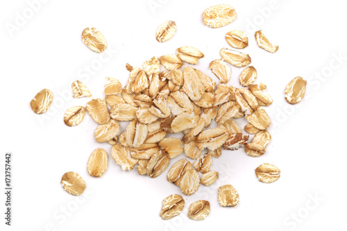 oat flakes isolated on white background. Top view photo