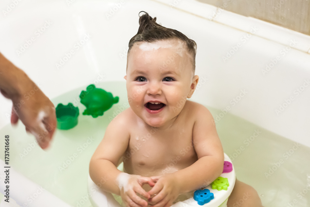 happy funny baby laughing and bathed in the bath happy funny baby laughing and bathed in the bath