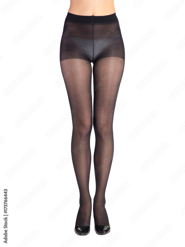 Shapely female legs dressed in dark tights Shapely female legs dressed in dark tights