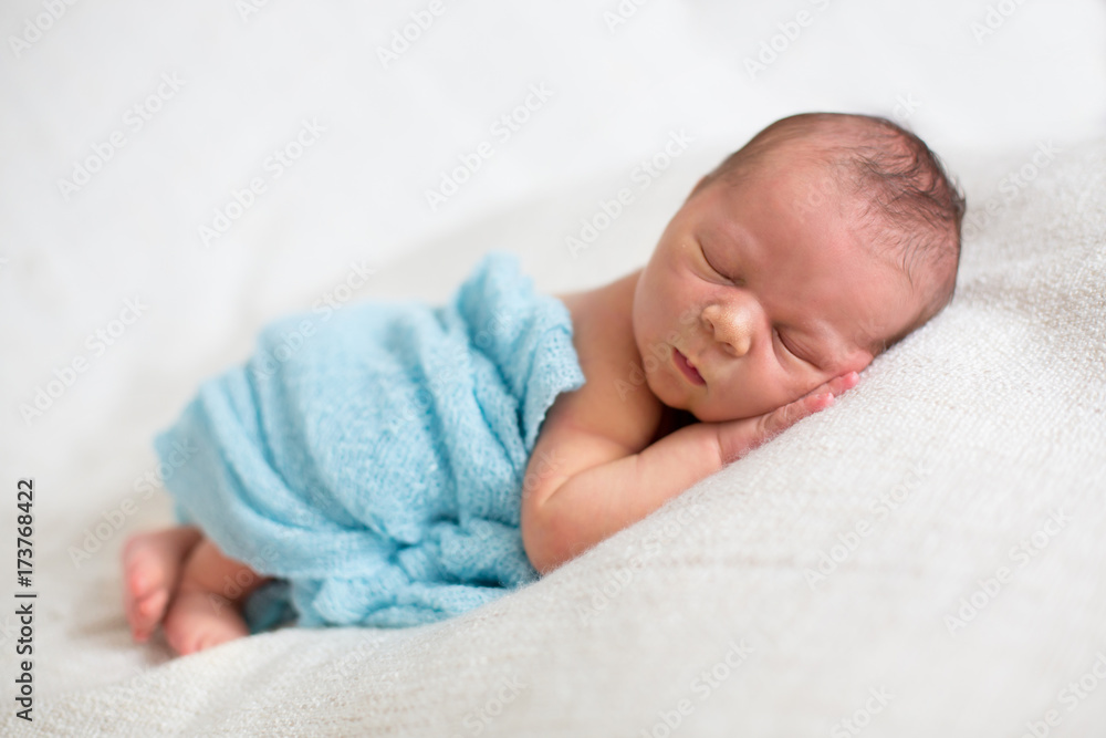 Newborn baby boy, sleeping happily Newborn baby boy, sleeping happily