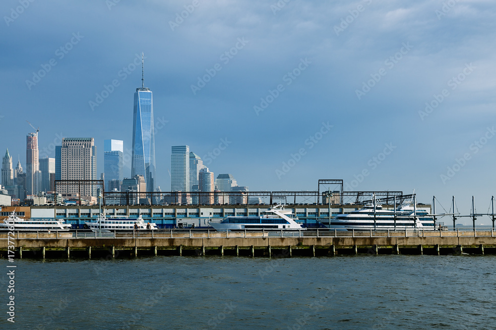 Manhattan Financial District in a Summer Day Viewed From Hudson River Manhattan Financial District in a Summer Day Viewed From Hudson River