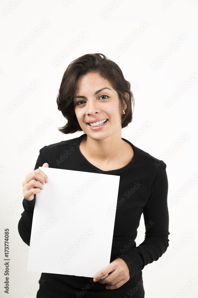 Beautiful young woman holding a blank sheet of paper Beautiful young woman holding a blank sheet of paper