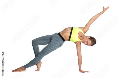A gymnast performs on the white background element
