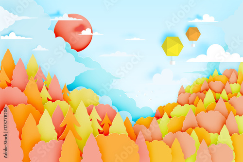 The hot air balloon with mountain background and beautiful landscape in autumn background