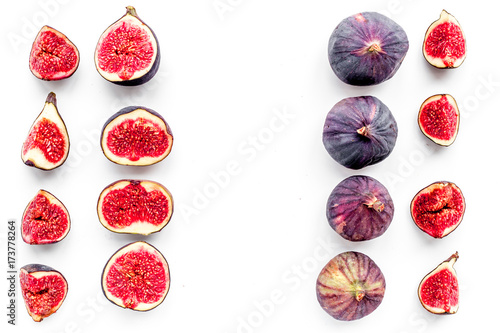 Fresh blue figs slices pattern on white background top view copyspace