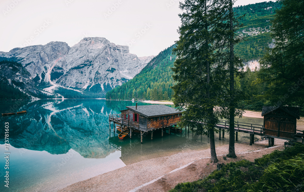 A famous boathouse at Braies Lake (Lago di Braies, Pragser wildsee). Trentino Alto Adidge, Dolomites, Alps, Italy