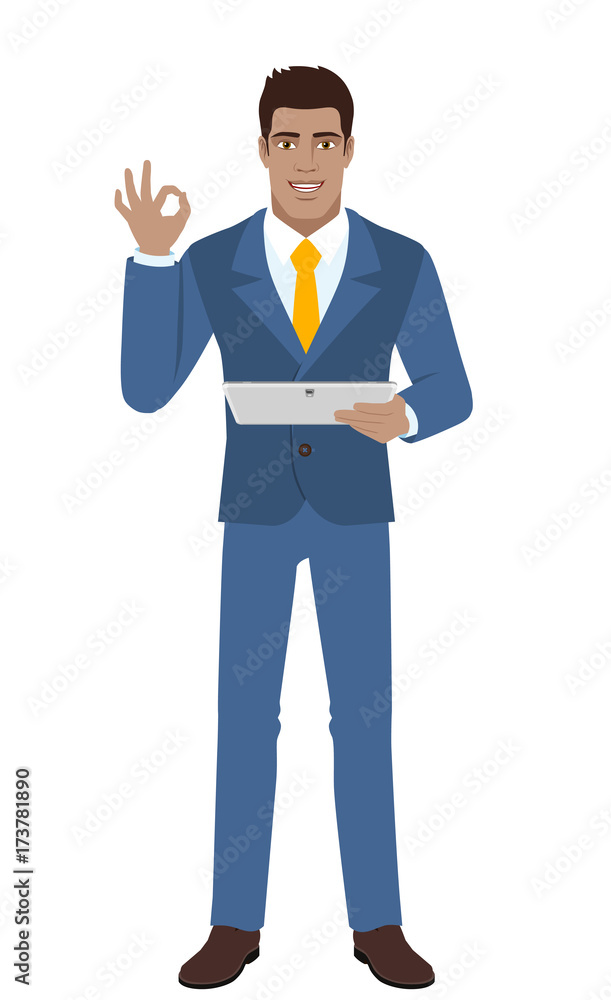 OK! Smiling businessman show a okay hand sign and holding digital tablet PC