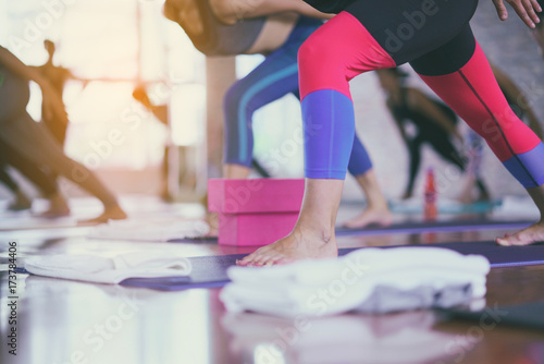 Group of girls to exercise, yoga in the studio