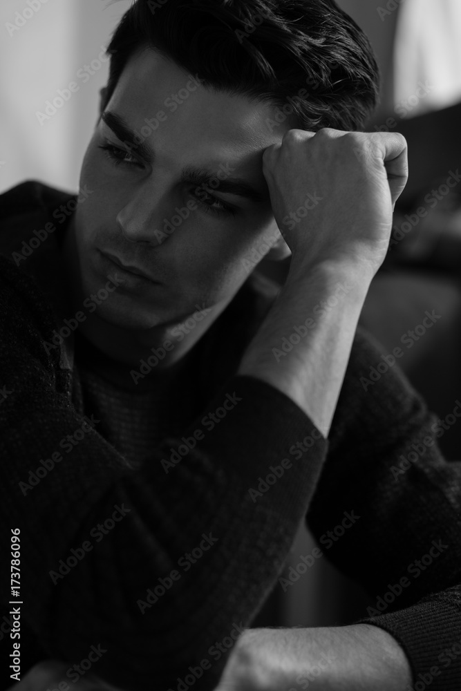 Closeup portrait of a young male in black and white Closeup portrait of a young male in black and white