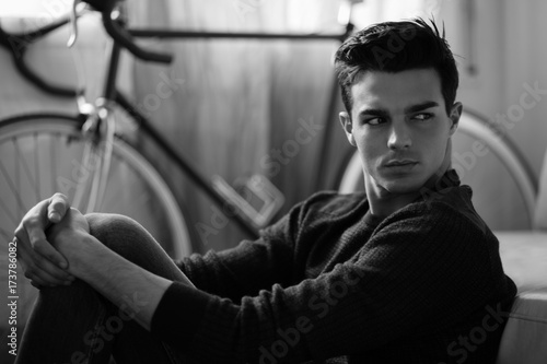 Closeup portrait of a young male in black and white