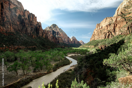 View of river flowing through mountains in Zion National Park
