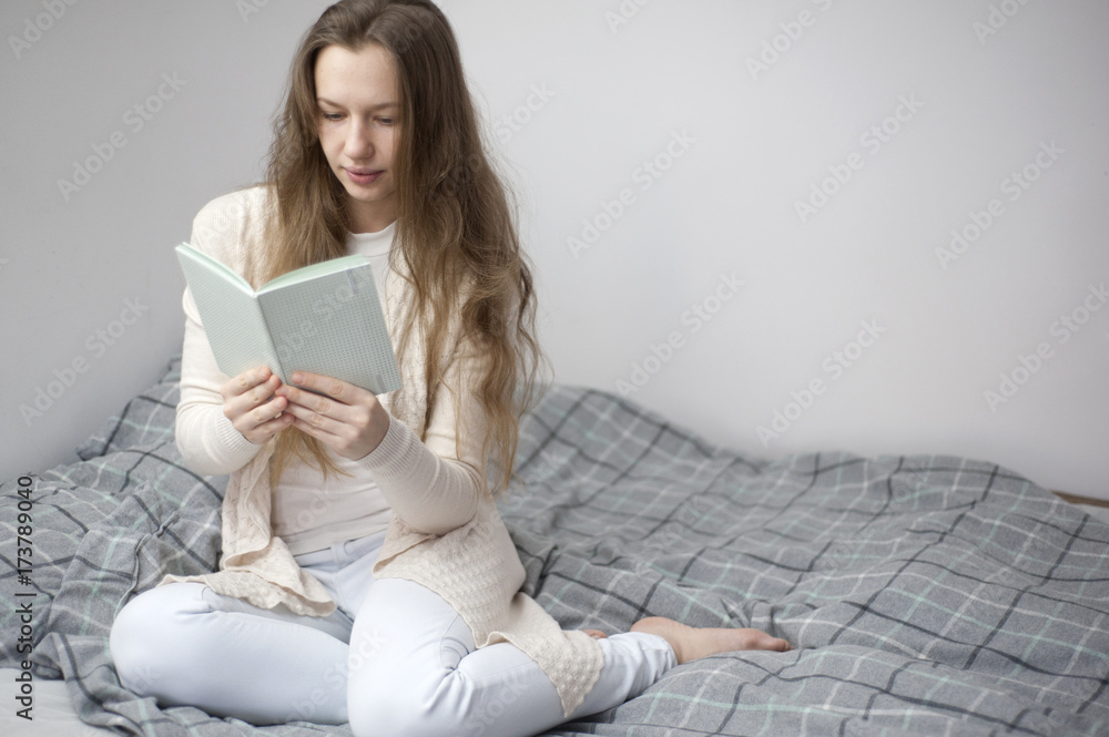 Young woman with a notebook Young woman with a notebook