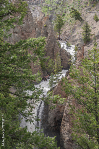 Waterfall flowing through Canyon.