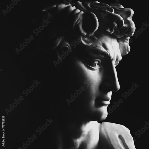 Close up of a classical sculpture of a man photo