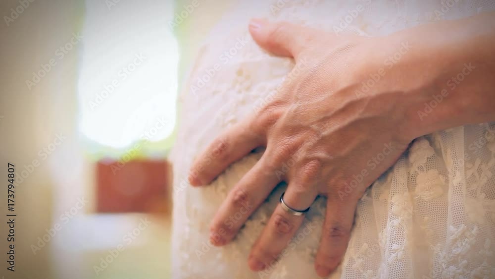 Pregnant Bride in Wedding Dress - Close Up Pregnant Bride in Wedding Dress - Close Up