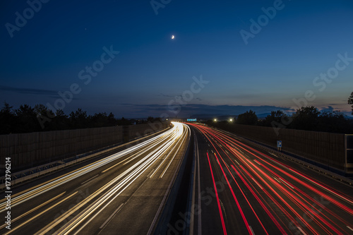 colorful light trace from highway traffic at night  © babaroga