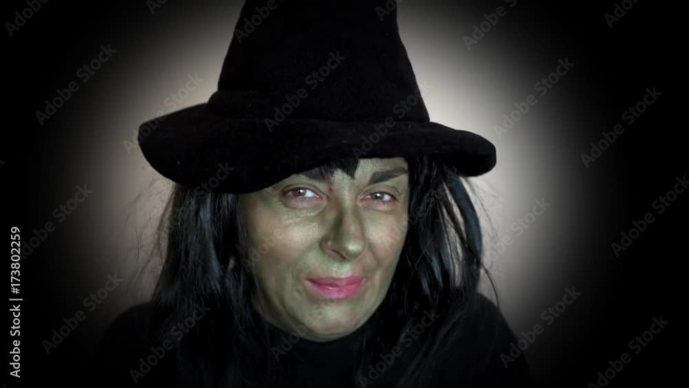 Spooky Halloween witch making a mean face Spooky Halloween witch making a mean face