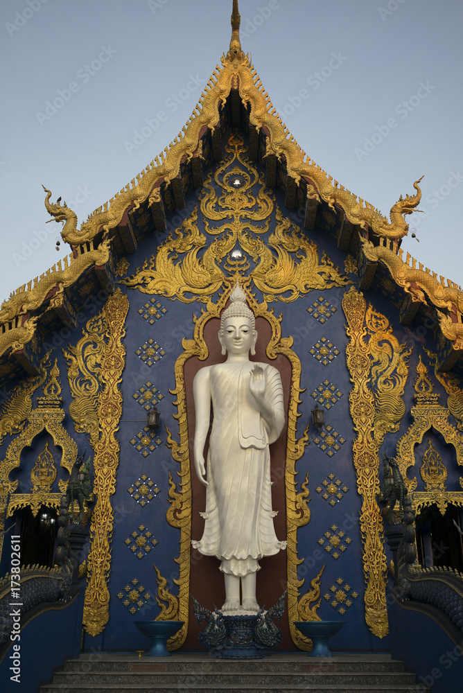 Obraz premium Statue of Buddha at temple, Rong Suea Ten Temple, Chiang Rai, Thailand