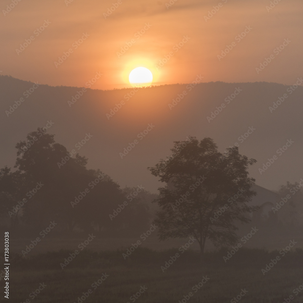 Fototapeta premium Sunrise over mountains, Chiang Rai, Thailand