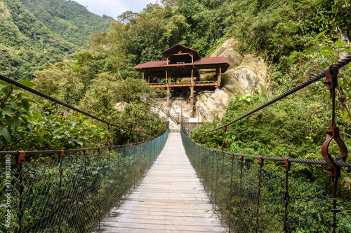 Wooden footbridge at Pailon del Diablo waterfall, Ecuador