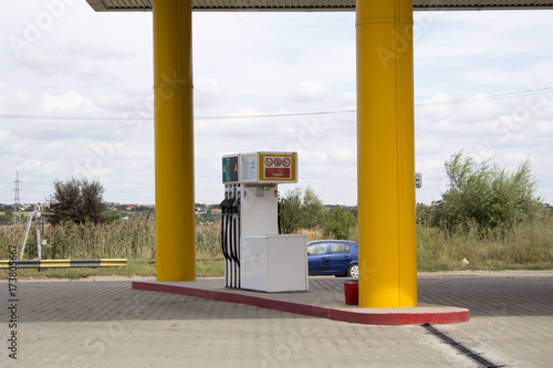 Empty petrol, diesel or gas yellow station at rural area