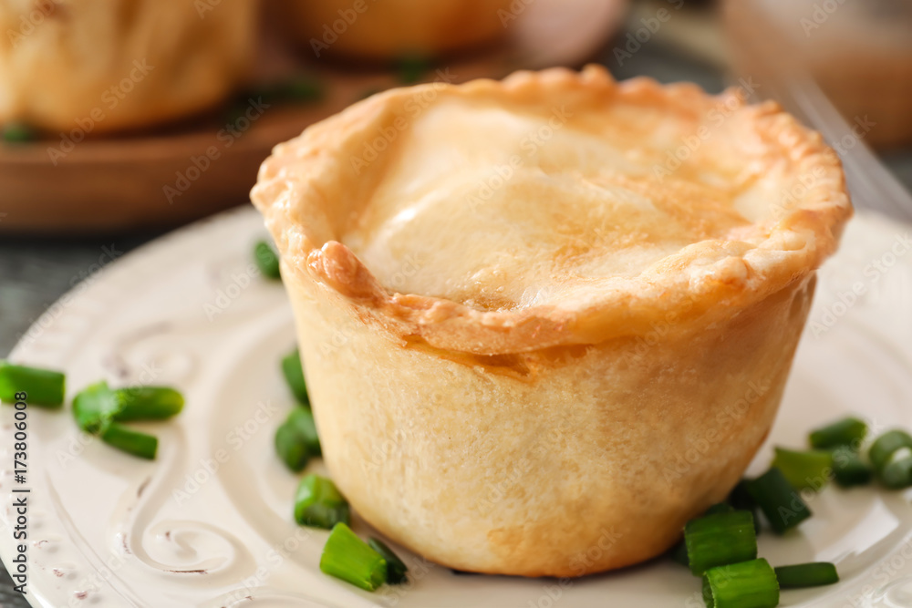 Delicious meat mini pie on plate, closeup Delicious meat mini pie on plate, closeup