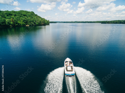 Overhead view of a boat and its wake