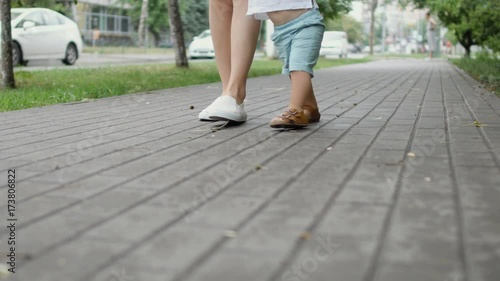 First steps of little boy photo