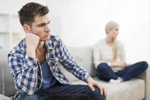 The angry man sit near a woman © realstock1