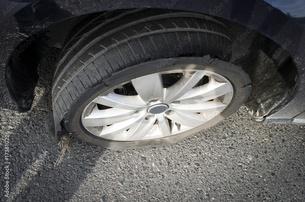 damaged tire after tire explosion at high speed on highway damaged tire after tire explosion at high speed on highway
